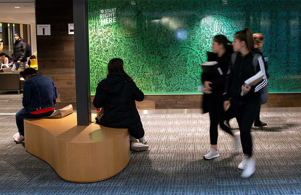 Students walking in the Library Building