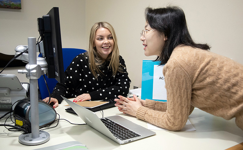 Student talking to advisor