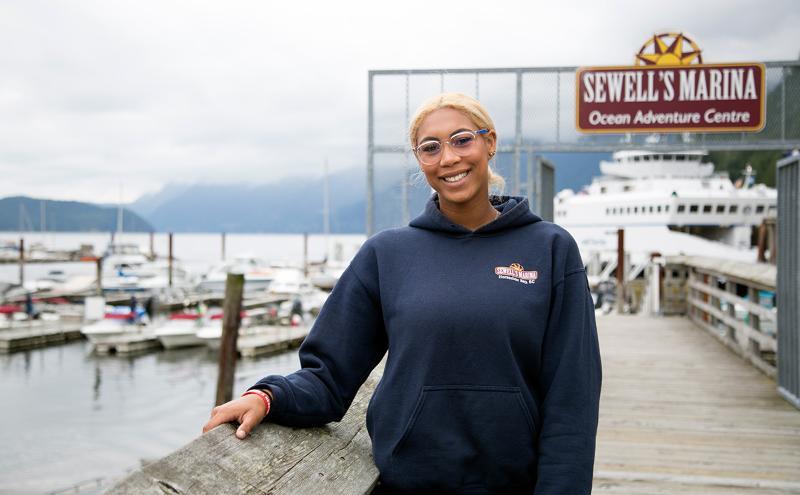 Student working at Sewell's Marina