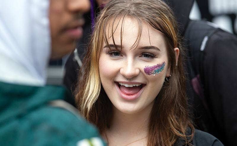 Student at event with glittery makeup