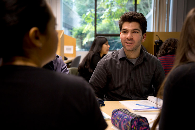 Guy talking in group