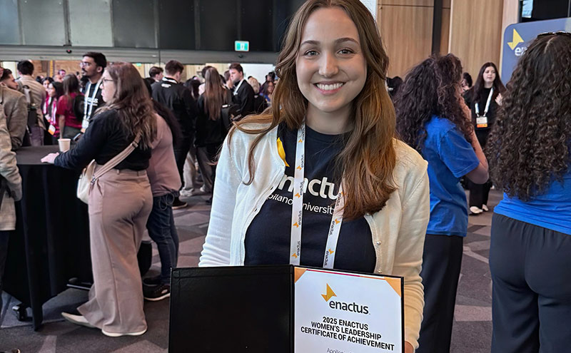 CapU Bachelor of Business Administration graduate Apollonia Giebel with her Enactus Award.