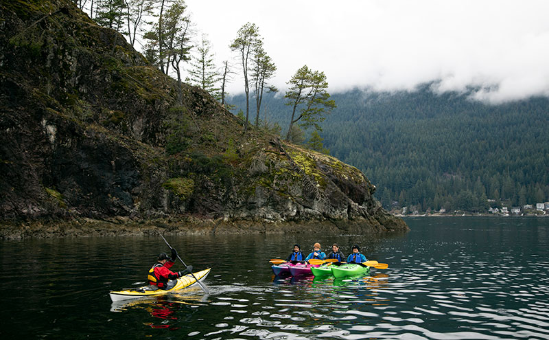 Students taking a kayaking course
