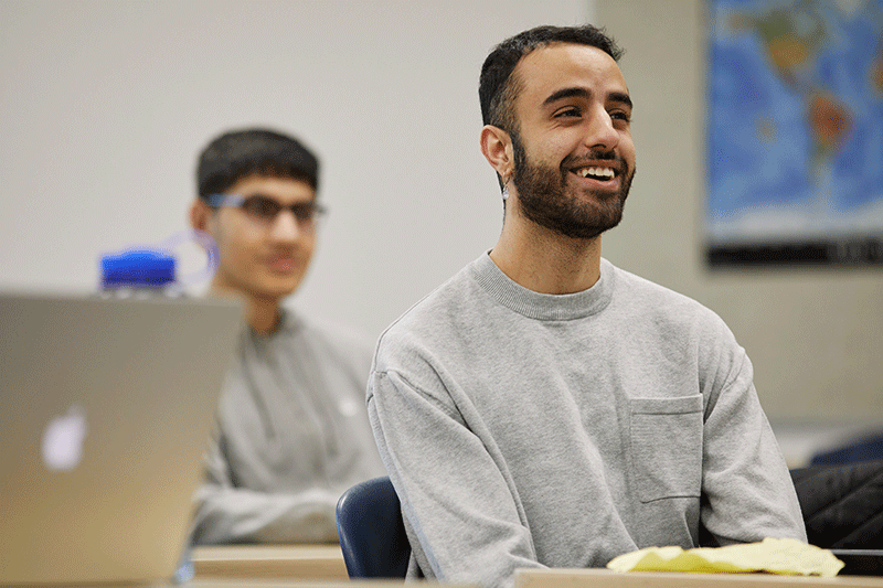 Students taking part in a class conversation.