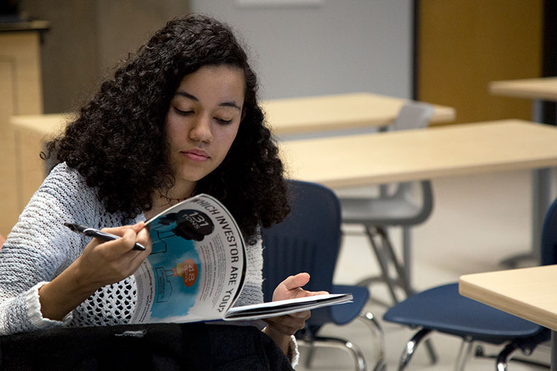 CapU communications student working on their magazine project.