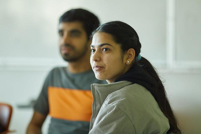 CapU NABU students listening to a presentation. 