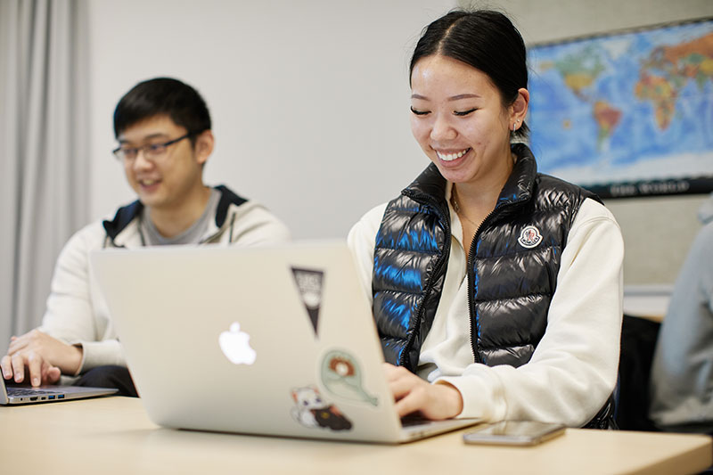 CapU Paralegal students working at their computers.