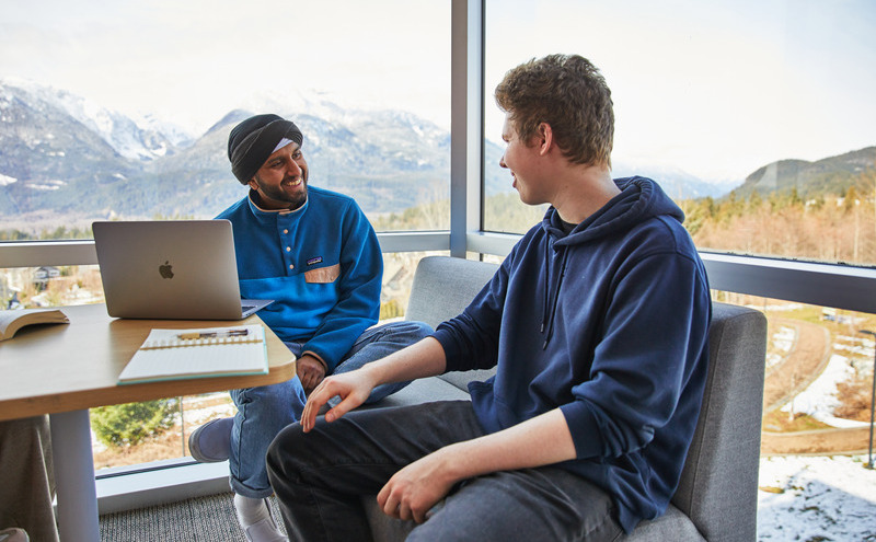Two CapU students in a study room at Squamish Campus.