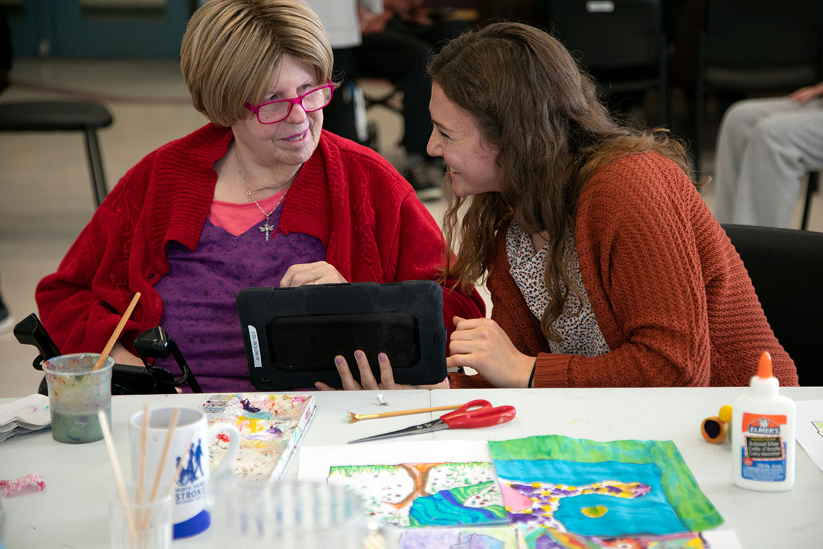 Rehabilitation Assistant student working with a client.