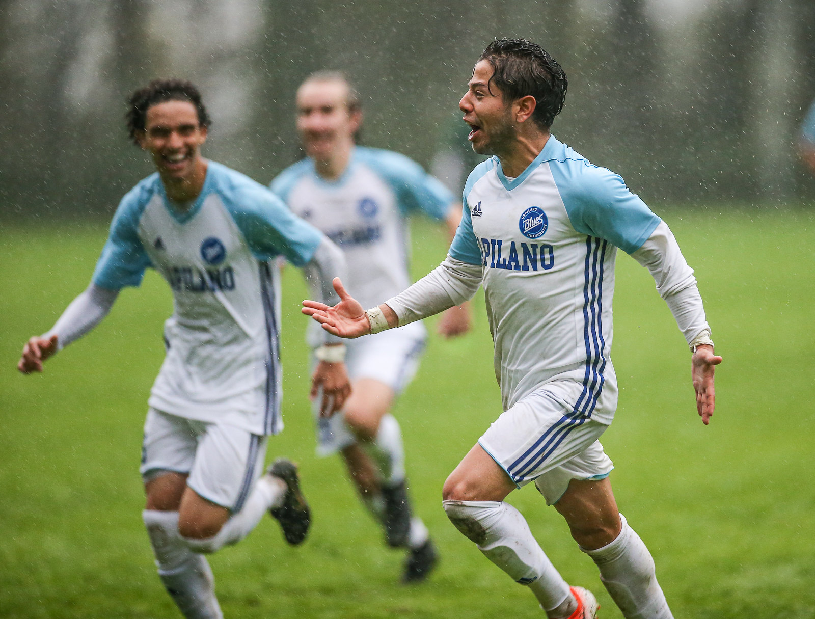 Men's soccer celebration