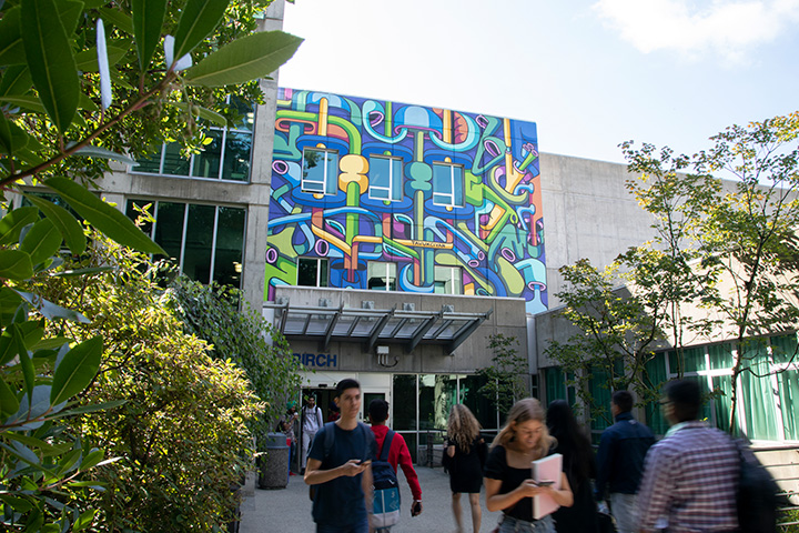 Students walking outside of the Birch Building