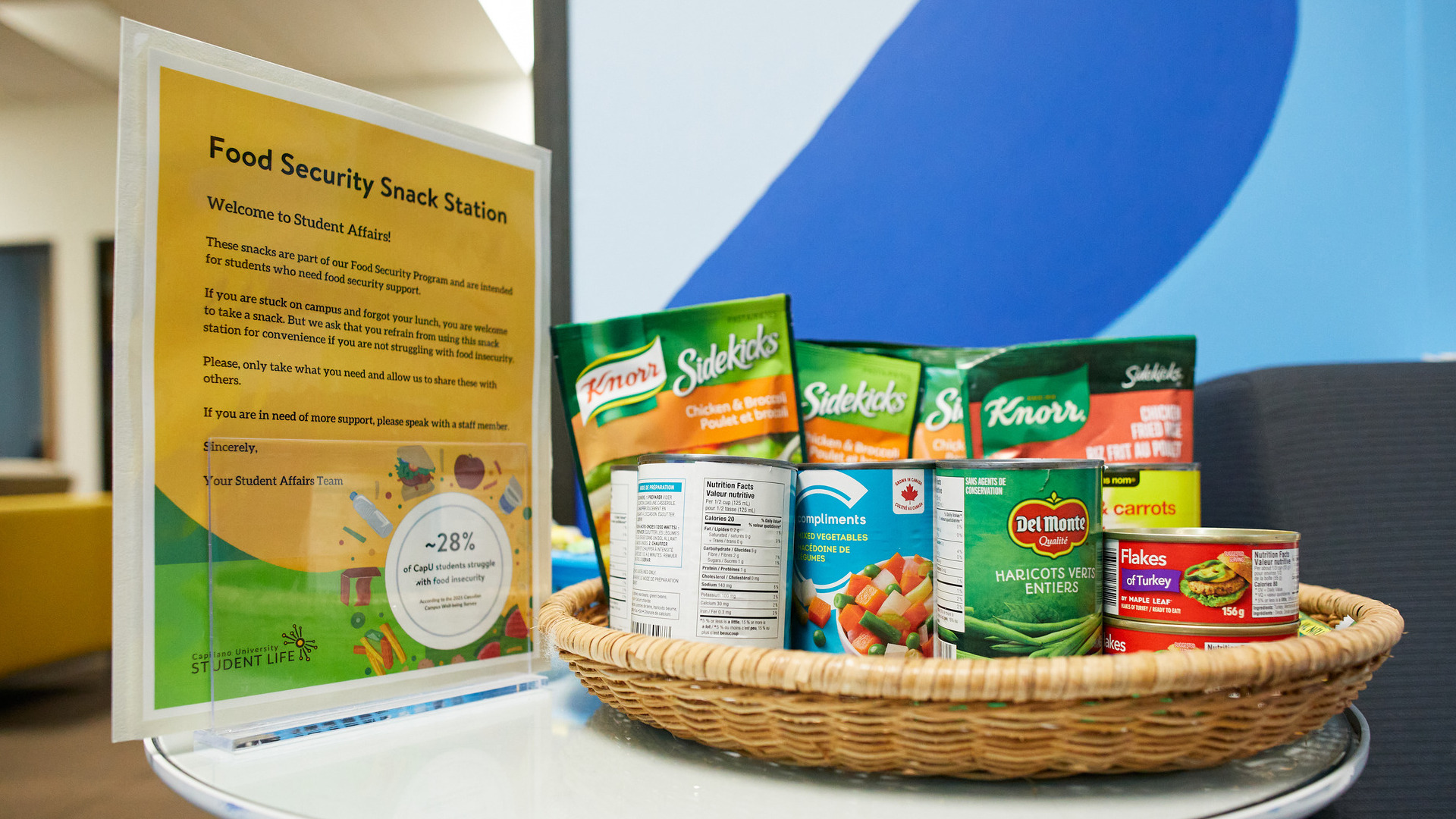CapU food security snack station with non-perishable food items available to support students experiencing food insecurity.