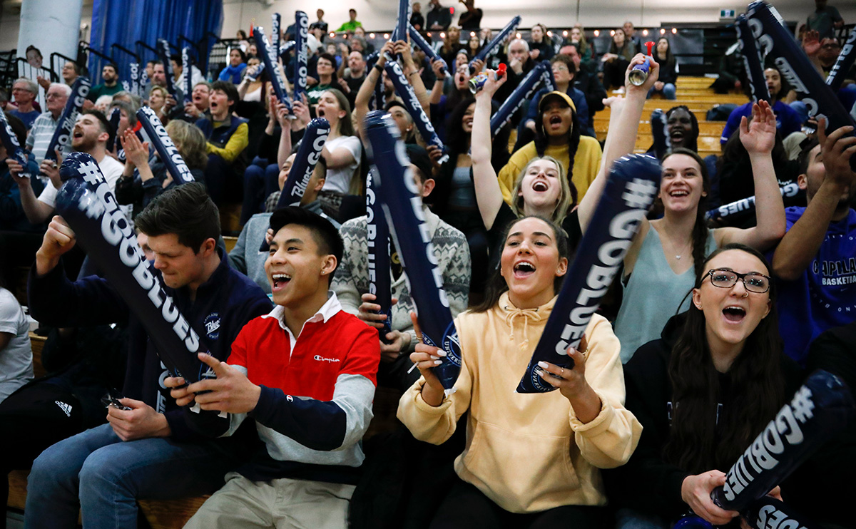 Students cheering on the Capilano Blues during the PacWest Basketball Championships