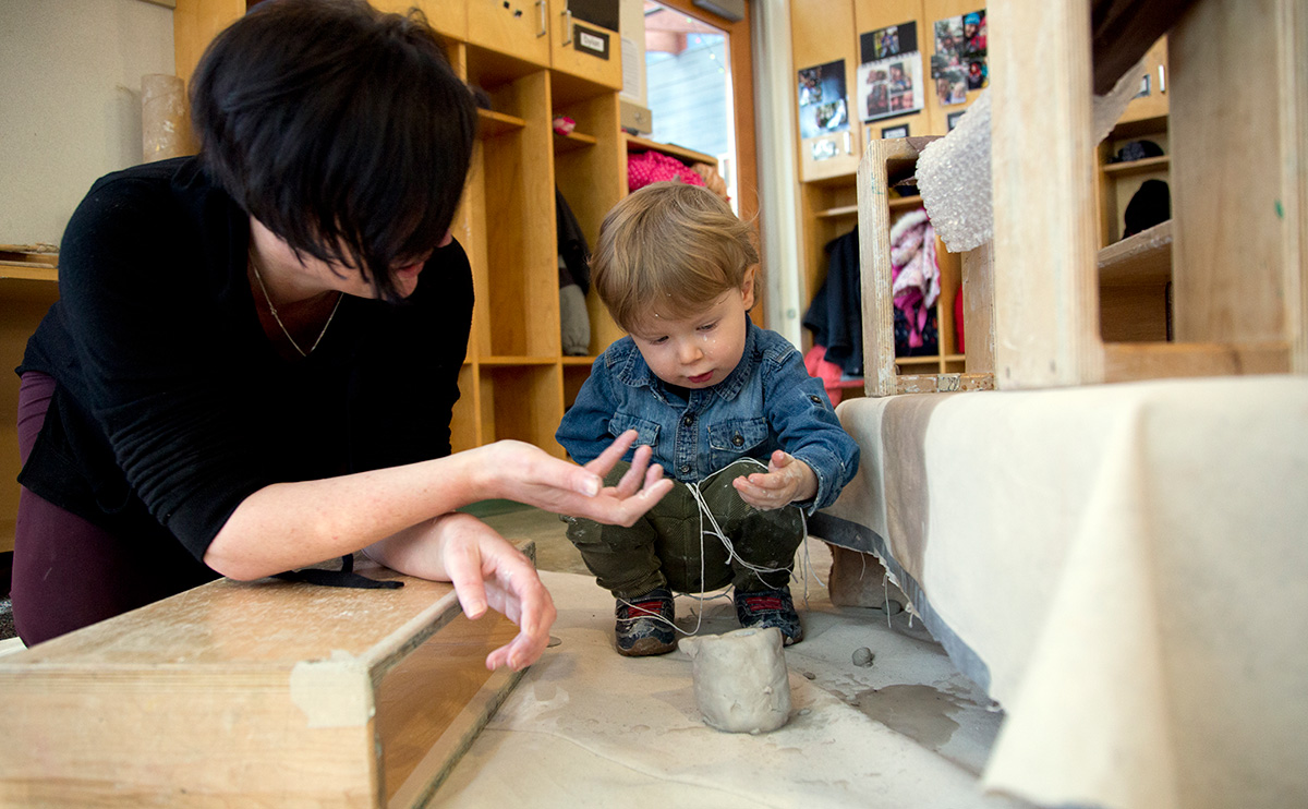 Staff and child in Childrens Centre