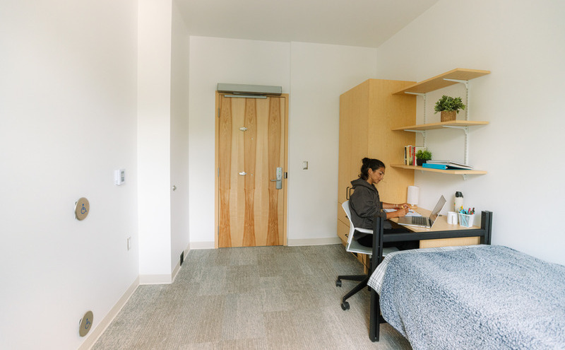 A student sitting in an accessible room