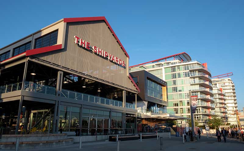 Outdoor photo of The Shipyards, the location of CapU Lonsdale.